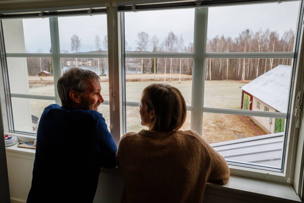 Iain and Julia at the window from inside