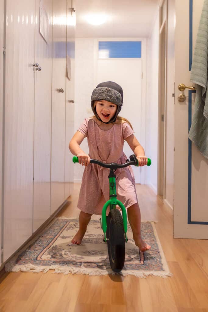 Girl cycling indoors